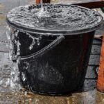 overflowing bucket